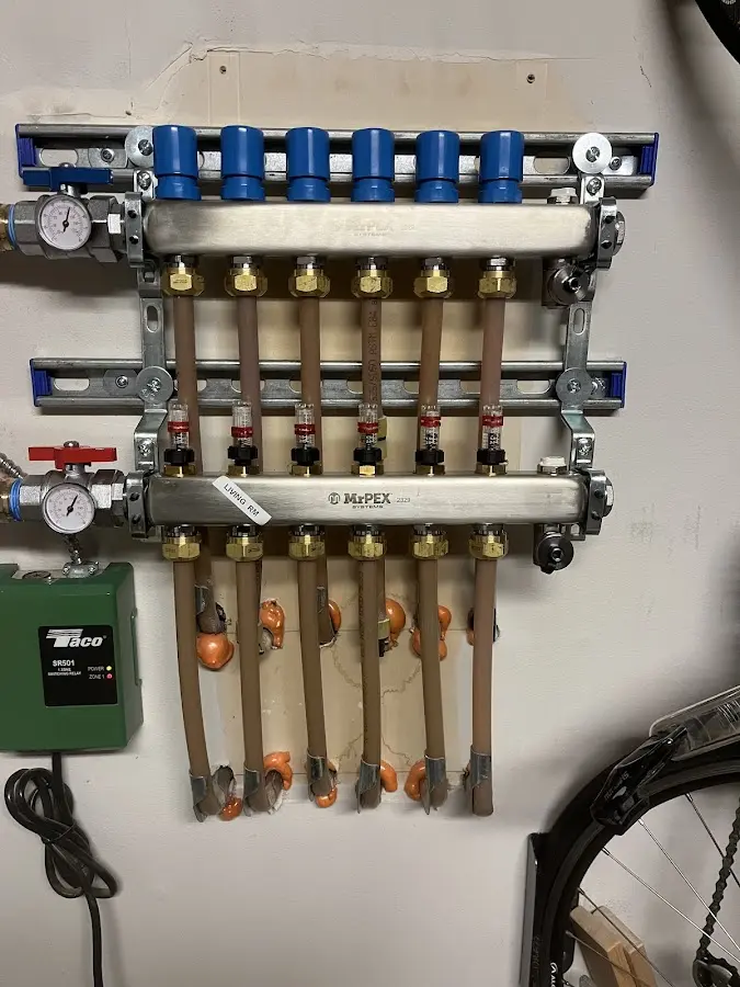 Plumber performing Water Heater Repair at a residential property in Orchards